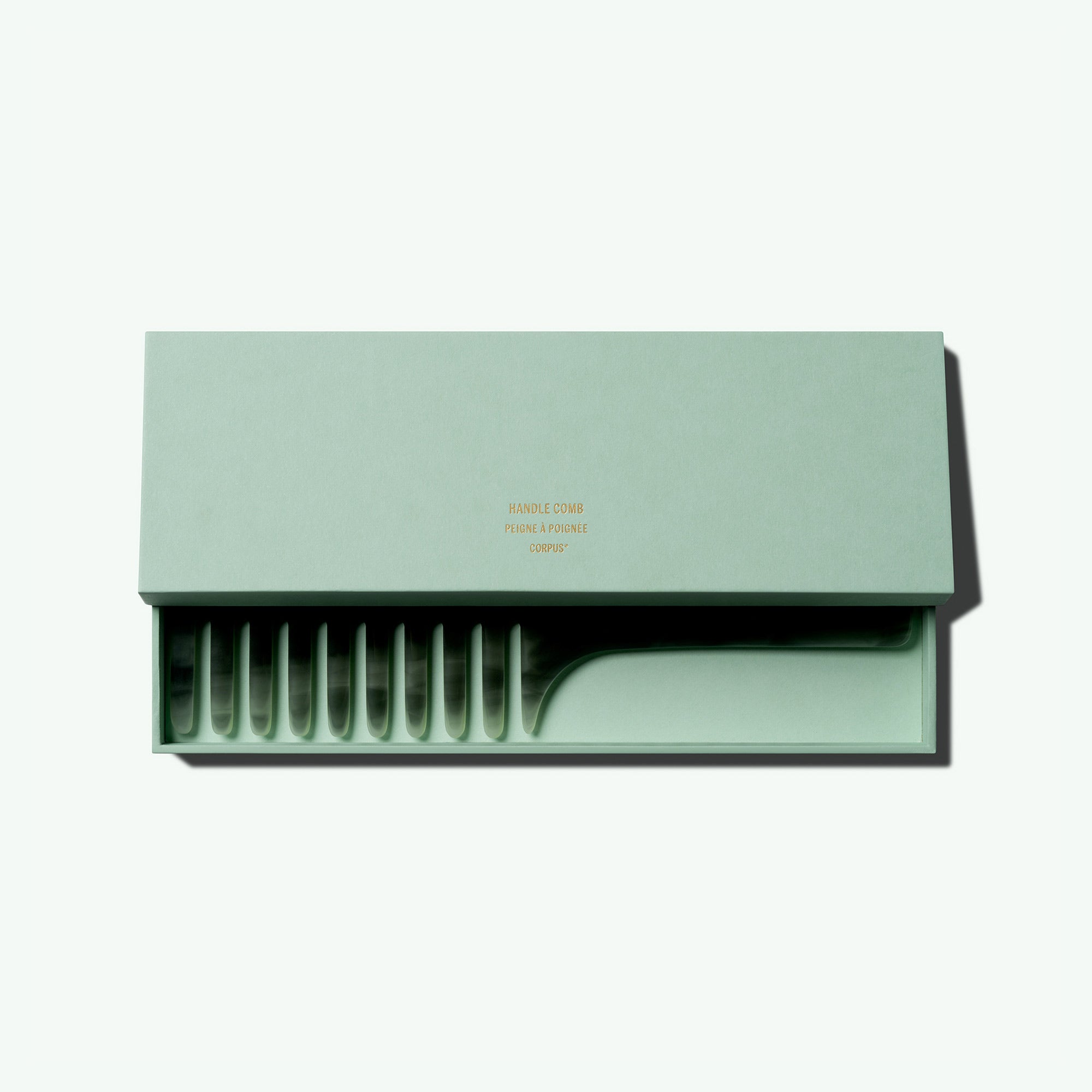 THE HANDLE COMB