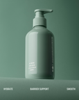 CORPUS Nº Green Body Cream green glossy bottle on a green ledge. Text reads: Hydrate. Barrier support. Smooth.